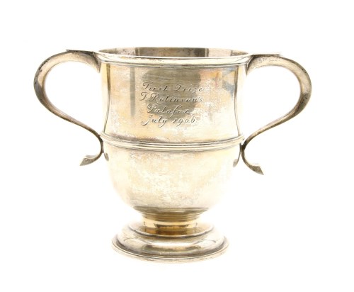 Lot 121 - An Edwardian silver twin handled trophy