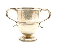 Lot 121 - An Edwardian silver twin handled trophy