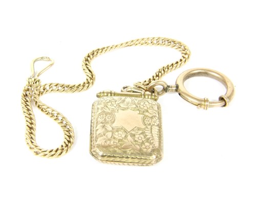 Lot 4 - A gold octagonal hinged locket