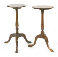 Lot 703 - Two mahogany tripod lamp tables