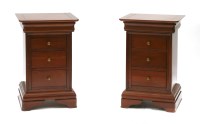 Lot 724 - A pair of modern mahogany bedside cupboards