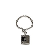 Lot 141 - A Chanel chain charm bracelet with quilted handbag charm