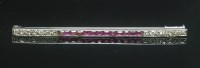 Lot 177 - A French Art Deco ruby and diamond bar brooch