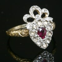 Lot 381 - A Georgian style ruby and diamond heart and bow cluster ring