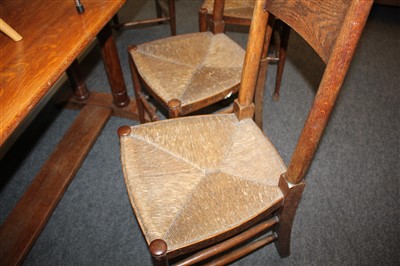 Lot 41 - A set of six Arts and Crafts oak dining chairs