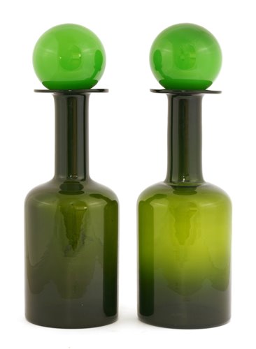 Lot 226 - Two green glass 'Gulvvase' bottle decanters and ball stoppers