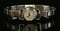 Lot 629 - A ladies' stainless steel Jaeger LeCoultre rear wind mechanical strap watch