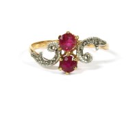 Lot 39 - A French gold two stone ruby crossover ring