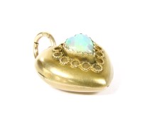 Lot 33 - A 9ct gold single stone opal heart shaped hinged locket