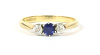 Lot 28 - An 18ct gold sapphire and diamond three stone ring