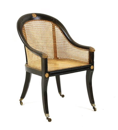 Lot 516 - A Regency ebonised curricle Beregere chair