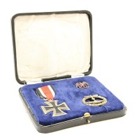 Lot 126 - A German submariners medal and badge group