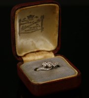 Lot 45C - A gold three stone diamond ring