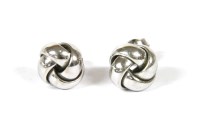 Lot 21 - A pair of 18ct white gold knot earrings retailed by Cellini