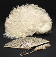 Lot 263 - A 19th century mother of pearl and lace fan