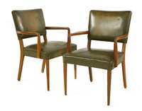Lot 154 - A pair of beechwood and green leather armchairs