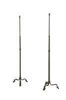 Lot 156 - A pair of wrought iron standard lamps