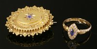 Lot 647 - An 18ct gold Edwardian sapphire and diamond marquise cluster ring