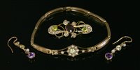 Lot 650 - A gold Edwardian yellow sapphire and split pearl gold bracelet