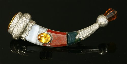 Lot 120 - A Scottish silver and hardstone hunting horn form brooch
