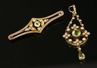 Lot 649 - An Edwardian gold peridot and split pearl pendant