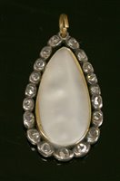 Lot 22 - An early Victorian blister pearl and diamond drop pendant