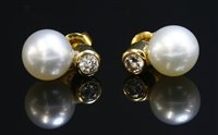 Lot 331 - A pair of gold cultured pearl and diamond earrings