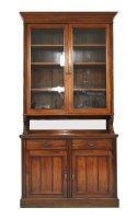 Lot 652 - A Victorian walnut bookcase with two glazed upper doors.
122cm wide