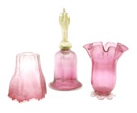 Lot 275 - A Vaseline glass and cranberry bell