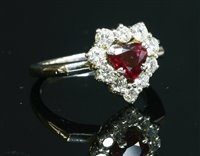Lot 512 - An 18ct white gold ruby and diamond cluster ring