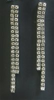 Lot 442 - A pair of Italian white gold two strand diamond drop earrings