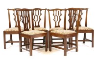 Lot 631 - A set of six Gothic Chippendale style mahogany dining chairs