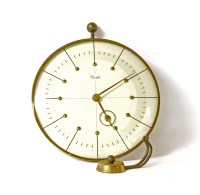 Lot 268 - An Art Deco Kienzle brass cased wall clock and bracket
