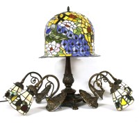 Lot 388A - A Tiffany design table lamp with faux stamped glass shade on naturalistic base