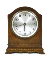 Lot 170 - An oak cased electric mantel clock by Bulle