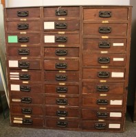 Lot 627 - A Victorian grained pine seed merchant's cabinet