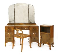 Lot 712 - An Art Deco walnut dressing table