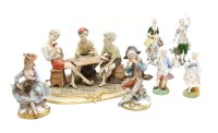 Lot 390 - A collection of ceramic figures to include Continental examples and a large Capodimonte figure group of card players (Qty)