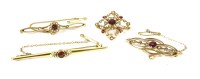 Lot 40 - A gold garnet and split pearl cluster bar brooch