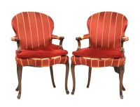 Lot 676 - A pair of Georgian style mahogany open armchairs