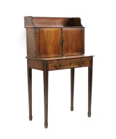 Lot 728 - A Rosewood and brass inlaid writing desk