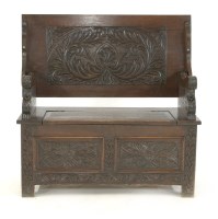 Lot 688 - An oak monks bench