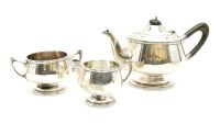 Lot 212 - A silver three piece tea service