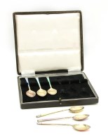 Lot 226 - A cased set of six guilloche enamel and silver gilt spoons