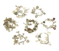 Lot 103 - Six assorted silver charm bracelets