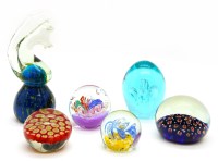Lot 302 - A collection of glass paperweights