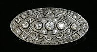 Lot 190 - A Continental Art Deco diamond set oval plaque brooch