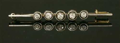 Lot 176 - A Continental Art Deco five stone diamond bar brooch