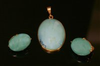 Lot 258 - A Chinese gold turquoise pendant and earring matched suite