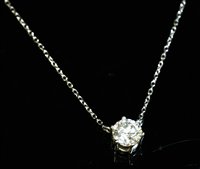 Lot 530 - A white gold single stone diamond pendant